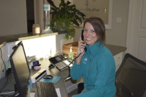 receptionist scheduling dental appointment for a new patient